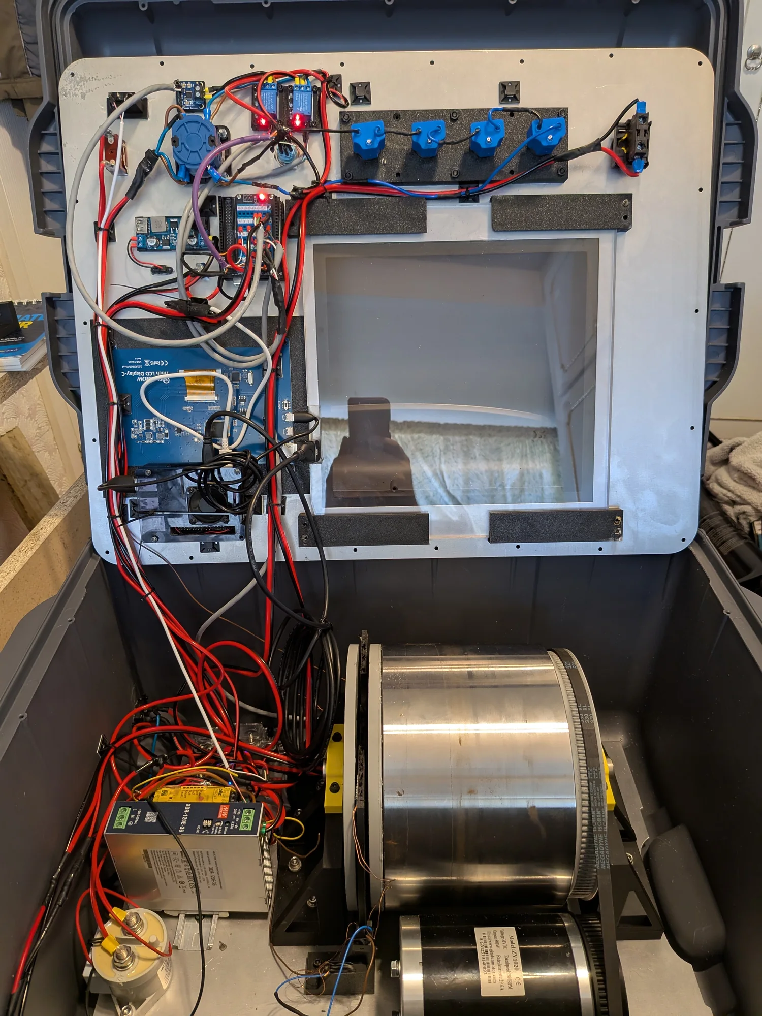 Inside the GiroStor demonstrator showing its flywheel, drive components, electronics and touchscreen assembly
